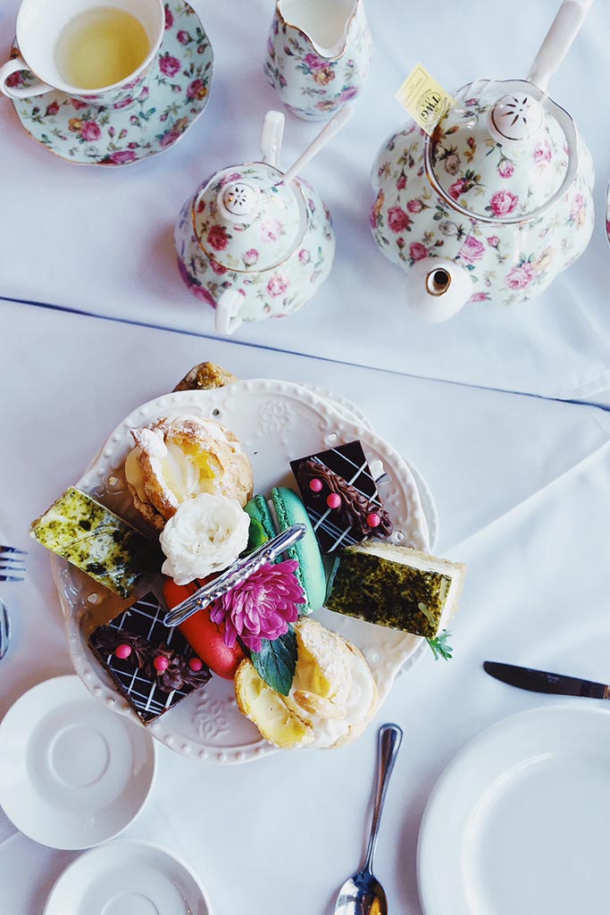 Afternoon tea is a white cloth experience inside the historic Huntingdon Manor Hotel. Credit: Scott Meis