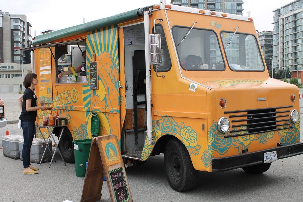 The orange taco truck is one of three Tacofino trucks that cruise the streets.