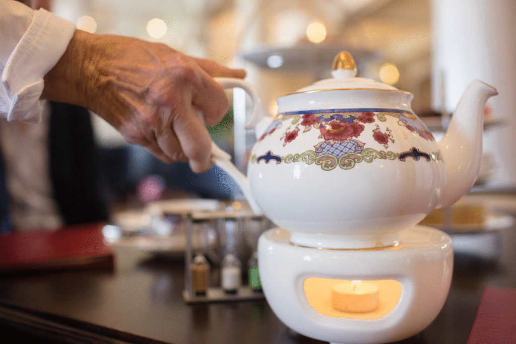 A candle-lit warmer keeps your tea at just the right temperature throughout the service. Photo: Lucas Anderson